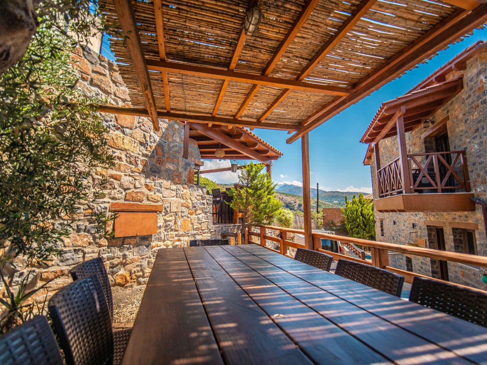 Petra Villas stone architecture with Cretan landscape